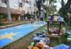 Com arte de Gurulino, esperança pelo hexa colore calçadas na Asa Norte